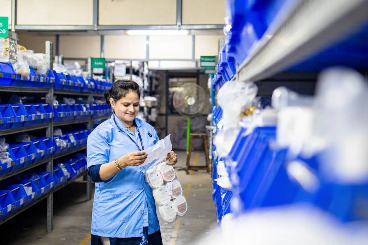 Staff member wearing a branded work uniform on the job